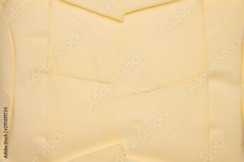 Butter.Oil background.The rustic texture of butter. photo