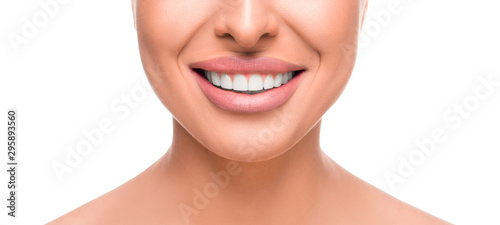Close up photo of toothy smiling woman. Tooth whitening concept.