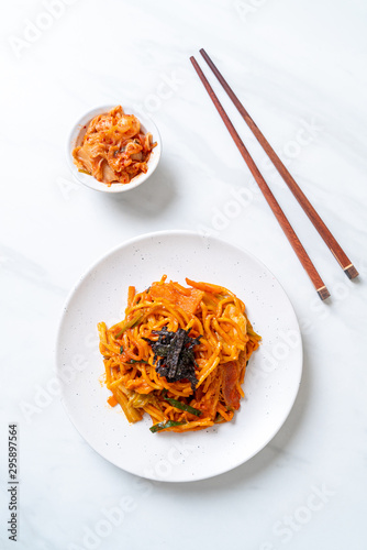 stir-fried noodles with Korean spicy sauce and vegetable photo