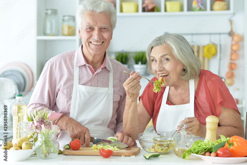 Close up portrait of senior couple cooking Close up portrait of senior couple cooking