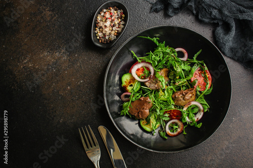 healthy salad with liver (tasty appetizer) menu concept. food background. copy space. Top view