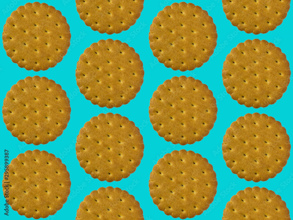 Pattern with cookie ornament on turquoise background Pattern with cookie ornament on turquoise background