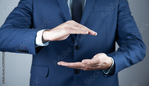 business man empty hand on gray background