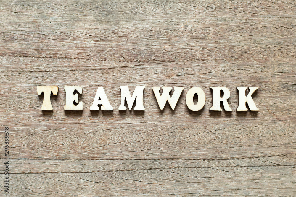 Letter block in word teamwork on wood background Letter block in word teamwork on wood background