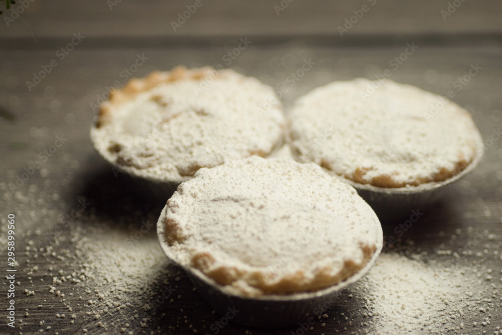 Sweet mince pies dusted with icing sugar 