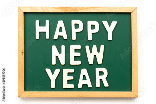 Letter in word happy new year on blackboard in white background