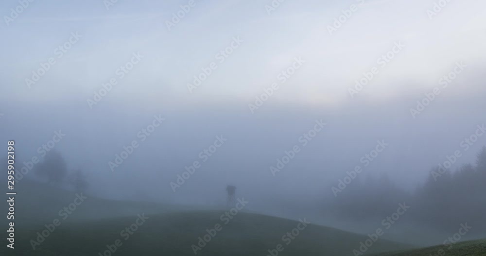 4k Time lapse of clouds fog rolling over grass and forest land of Saint Thomas, Slovenia 4k Time lapse of clouds fog rolling over grass and forest land of Saint Thomas, Slovenia