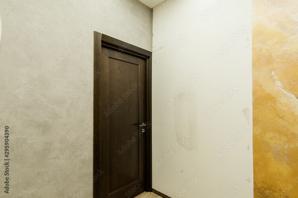 Russia, Moscow- May 20, 2019: interior room apartment. standard repair decoration in hostel. room doors, repair Russia, Moscow- May 20, 2019: interior room apartment. standard repair decoration in hostel. room doors, repair
