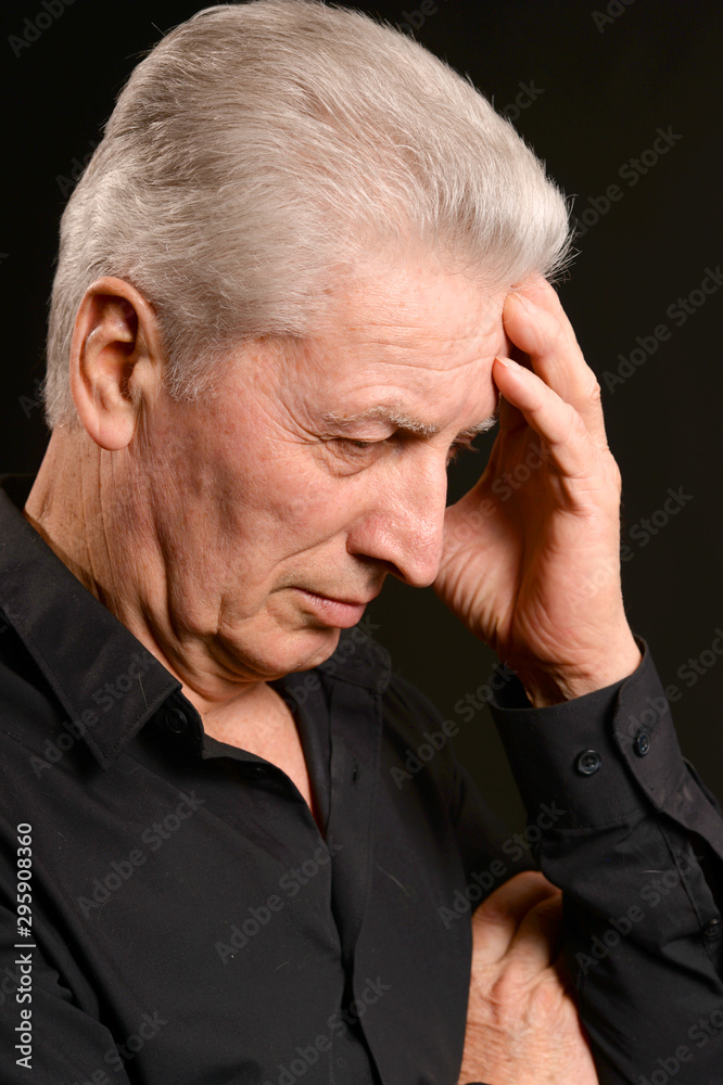 Close up portrait of thoughtful senior man