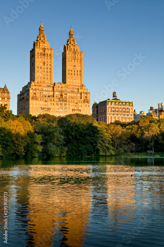 Manhattan Upper West Side across Central Park Lake on Autumn morning. New York City