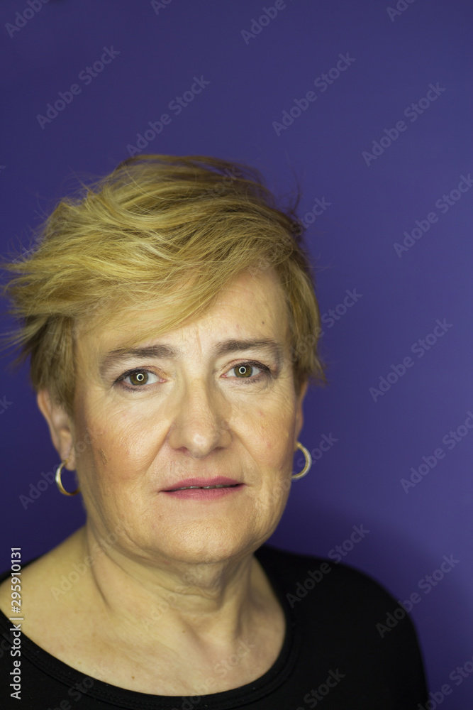 Middleaged woman with blond short hair Middleaged woman with blond short hair