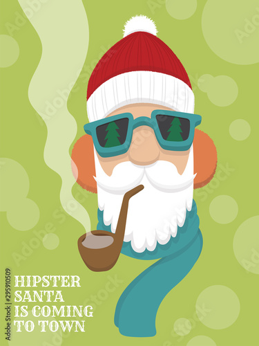 Flat vector cartoon of hipster Santa Claus with fluffy beanie, blue sunglasses, orange earmuffs, blue scarf, and pipe with smoke on light green background. Text reads Hipster Santa is Coming To Town.