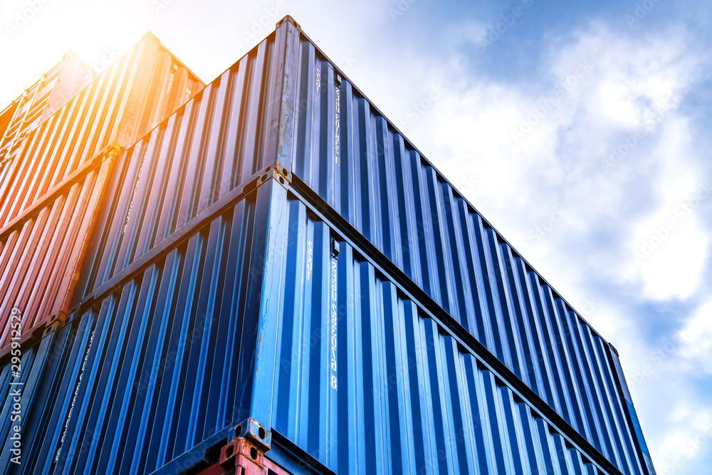 Stack of containers box from Cargo freight ship for import-export at harbor and transportation industrial concept.