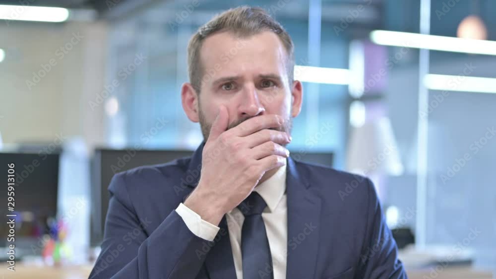 Portrait of Young Businessman get Shocked in Office Portrait of Young Businessman get Shocked in Office