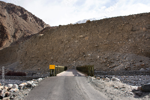 Be careful stone slide landslide on the road between Diskit - Turtok Highway road go to Pangong Tso high grassland lake while winter season at Leh Ladakh in Jammu and Kashmir, India