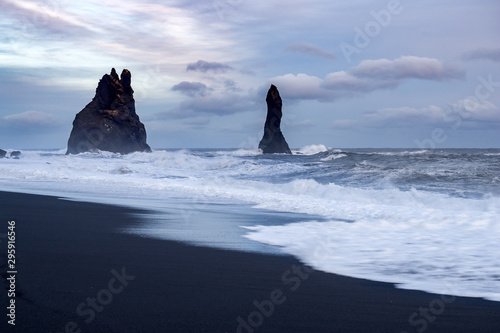 Waves crash on to black volcanic beach in Vik, Iceland © Jimmy