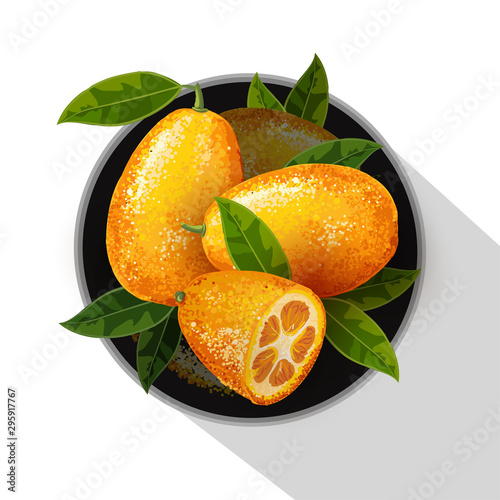 Exotic fruit kumquat with green leaves on the plate.