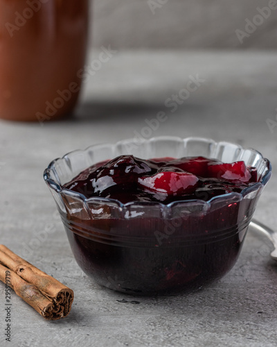 Peruvian purple jam dessert called mazamorra morada with dried fruits. photo