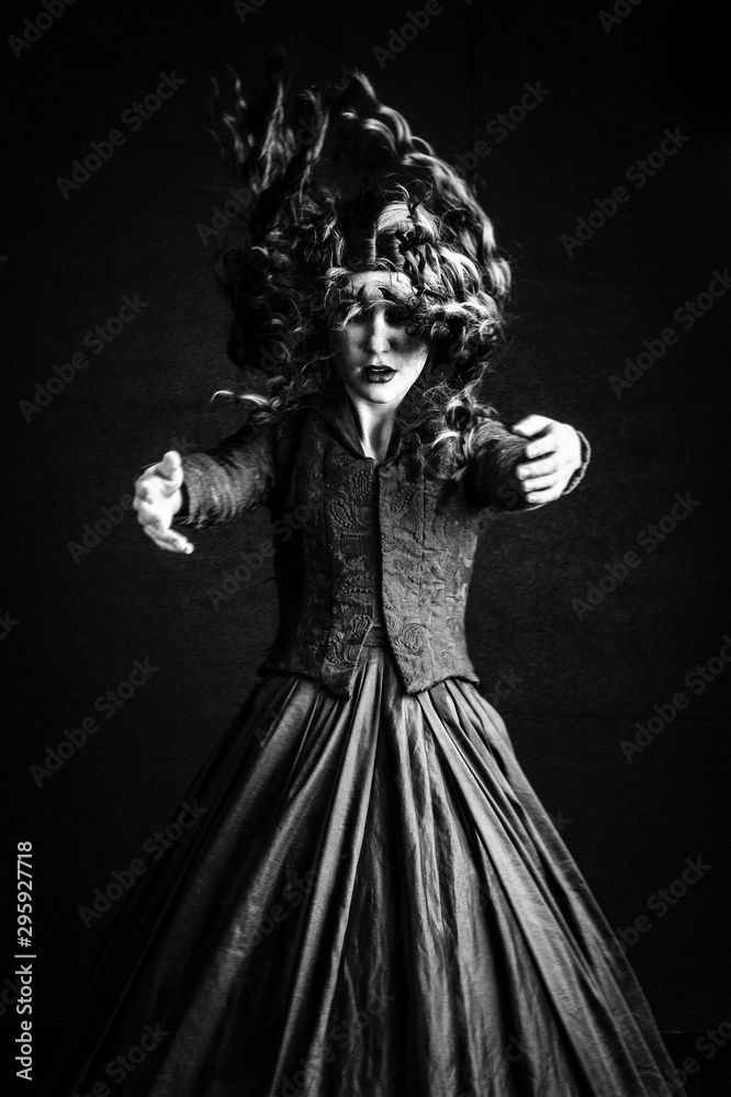 Spooky images of woman in black vintage outfit