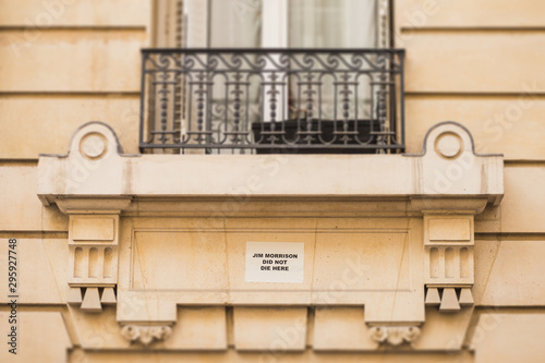 The inscription on the house in Paris where Jim Morrison from the Doors lived and died - Jim Morrison did not die here photo