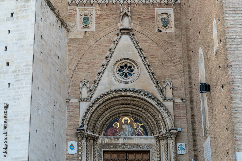 San Giustino Cathedral's gate, details of mosaic on the top of gate, in Chieti, Abruzzo, Italy
