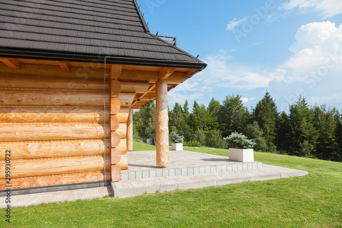 A new wooden house with patio on high mountains.