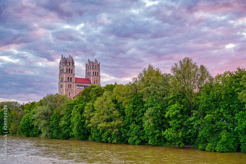 The Church of St. Maximilian along the Isar River at sunset in Munich, Bavaria, Germany.