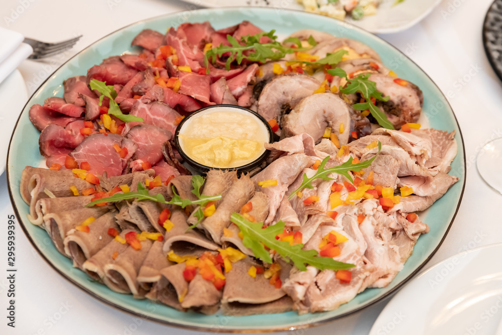 Cold smoked meat plate with pork chops, prosciutto, salami. Cold smoked meat plate with pork chops, prosciutto, salami.