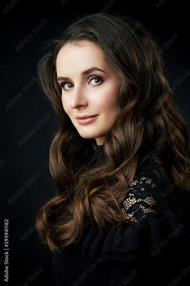 portrait of a lovely young woman in a studio 