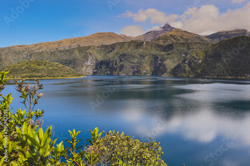 Mountains overlooking a blue lake.