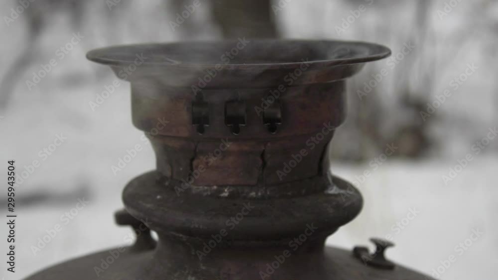 hot russian samovar outdoors in the forest in winter hot russian samovar outdoors in the forest in winter