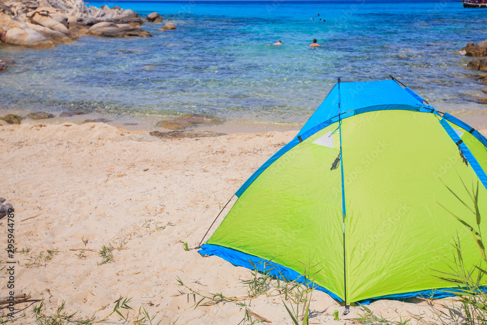 Summer vacation camping on lonely sand beach