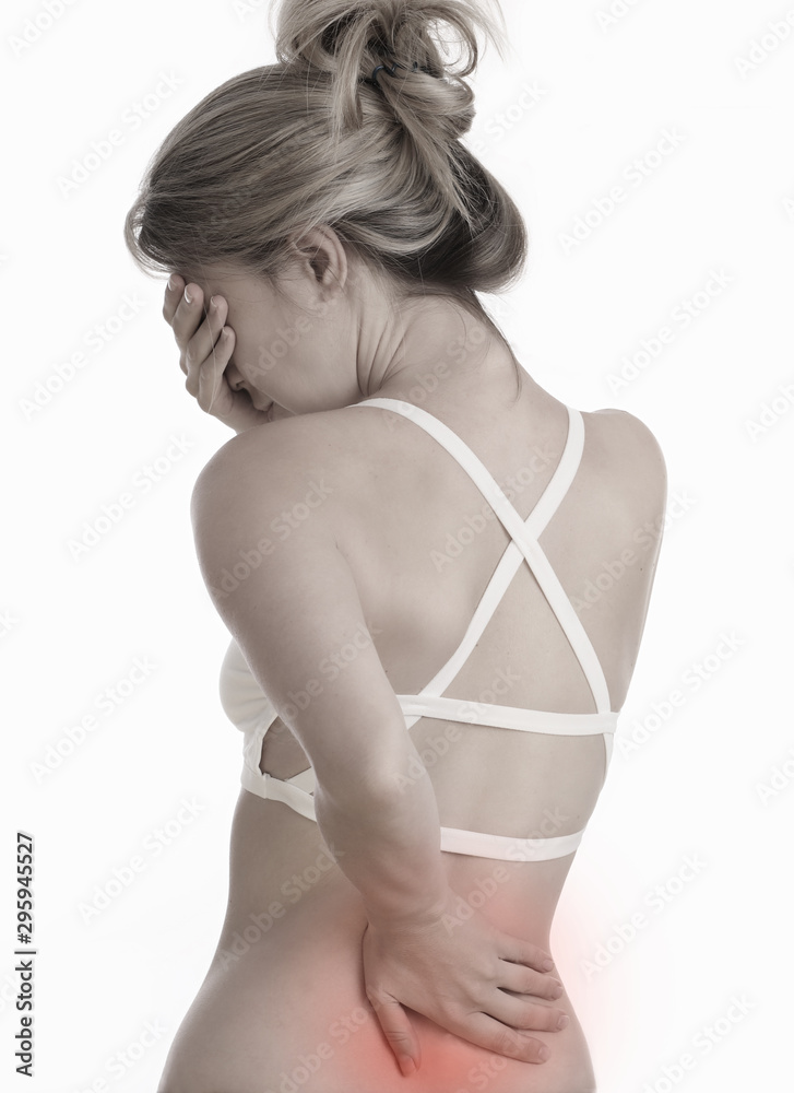 Naklejka premium Woman suffering from back and neck pain. Muscle spasm, .Chiropractic concept. Sport exercising injury