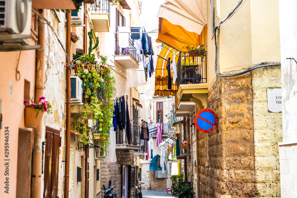 Colorful and old alleys of the touristic Italian city of Bari.