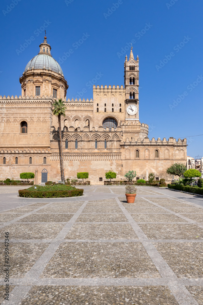 The front view of the Palermo Cathedral or Cattedrale di Palermo dome and tower in a nice sunny afternoon in Palermo, Sicily.