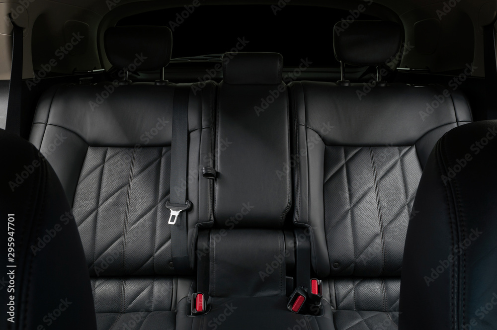 Leather seats in modern car. Interior detail background.