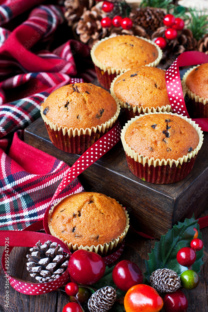 Christmas composition with muffins and decorations