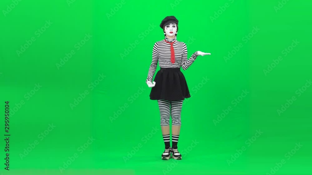 Mime eating something, showing thumbs up. Chroma key. Full length. Mime eating something, showing thumbs up. Chroma key. Full length.