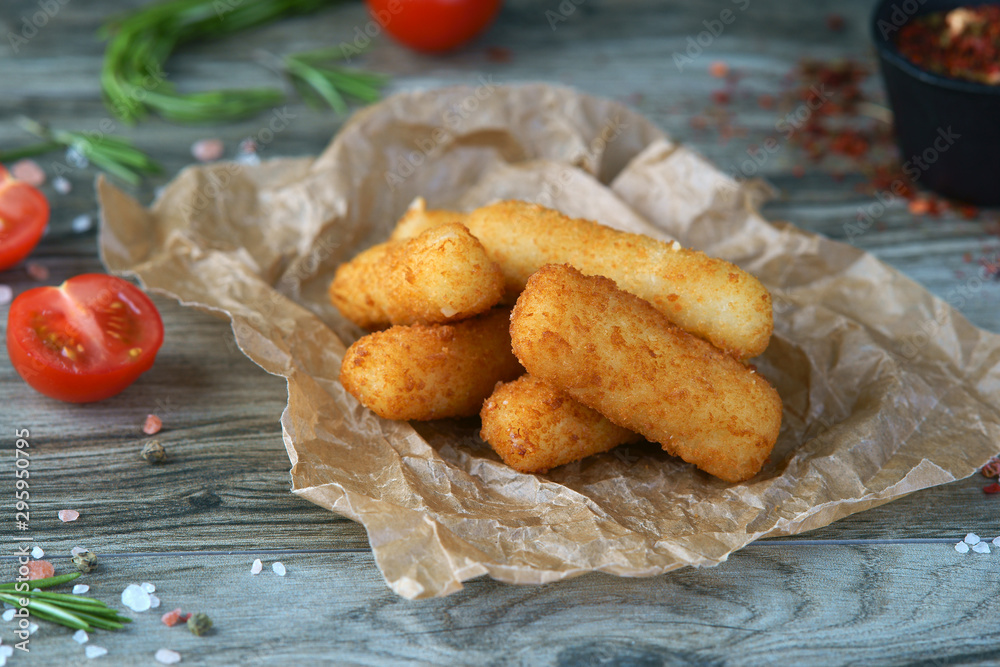 cheese croquettes on a wooden background Stock Photo | Adobe Stock