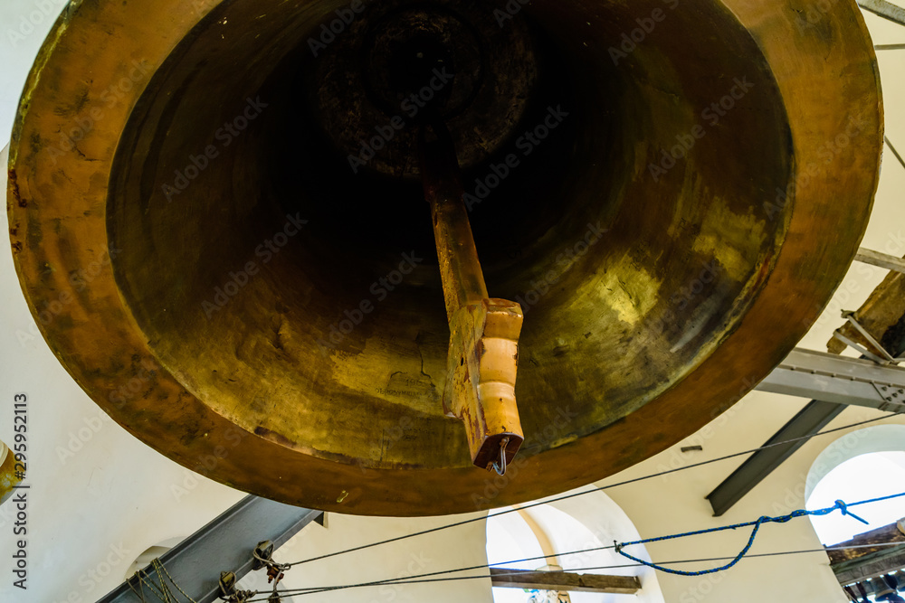 Big bell on the bell tower of church. Closeup