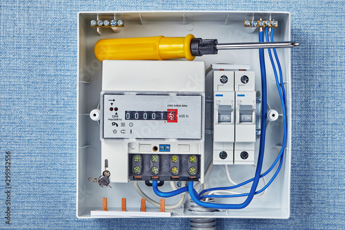 Circuit breaker panels with electricity meters.