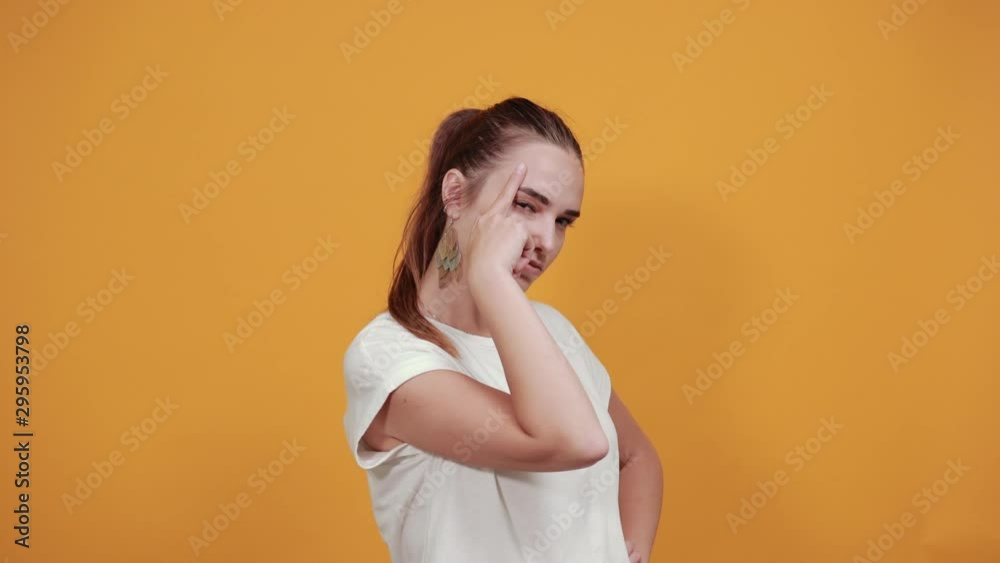Smart girl being thoughtful by thinking about something. She is quite focused on her task as she is thinking deeply. Smart girl being thoughtful by thinking about something. She is quite focused on her task as she is thinking deeply.