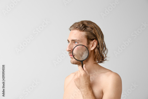 Portrait of young man with ...