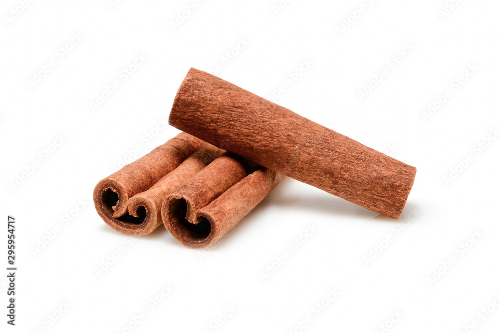 Cinnamon sticks for cooking and cosmetics. Close up macro isolated on white background with shadow. Full depth of field, high resolution. Cinnamon sticks for cooking and cosmetics. Close up macro isolated on white background with shadow. Full depth of field, high resolution.