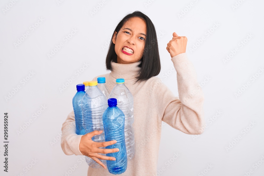 Young Asian Woman With Water Bottle On White Background Stock