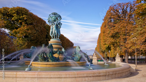 Paris, France - October 12, 2019: The Fontaine de l'Observatoire is a monumental fountain located in the Jardin Marco Polo, south of the Jardin du Luxembourg in the 6th arrondissement of Paris