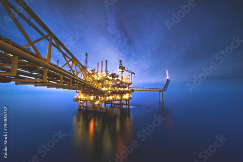 Industrial Offshore oil and gas,Oil rig platform with milky way at night