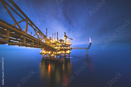 Industrial Offshore oil and gas Oil rig platform with milky way at night