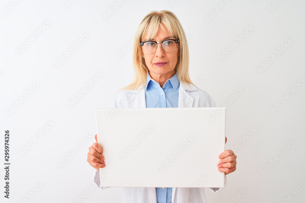 Middle age scientist woman wearing glasses holding banner over isolated white background with a confident expression on smart face thinking serious Middle age scientist woman wearing glasses holding banner over isolated white background with a confident expression on smart face thinking serious