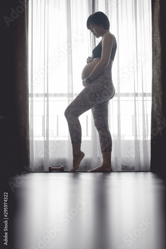 Free Download pregnant woman standing over curtain. - GFXLoad